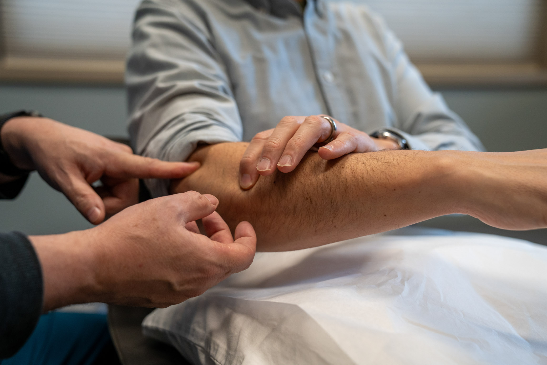Dr. Franke performing electrodiagnostic examination