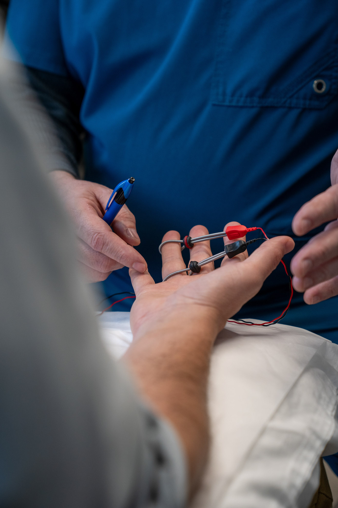 Nerve conduction testing on patient's hand
